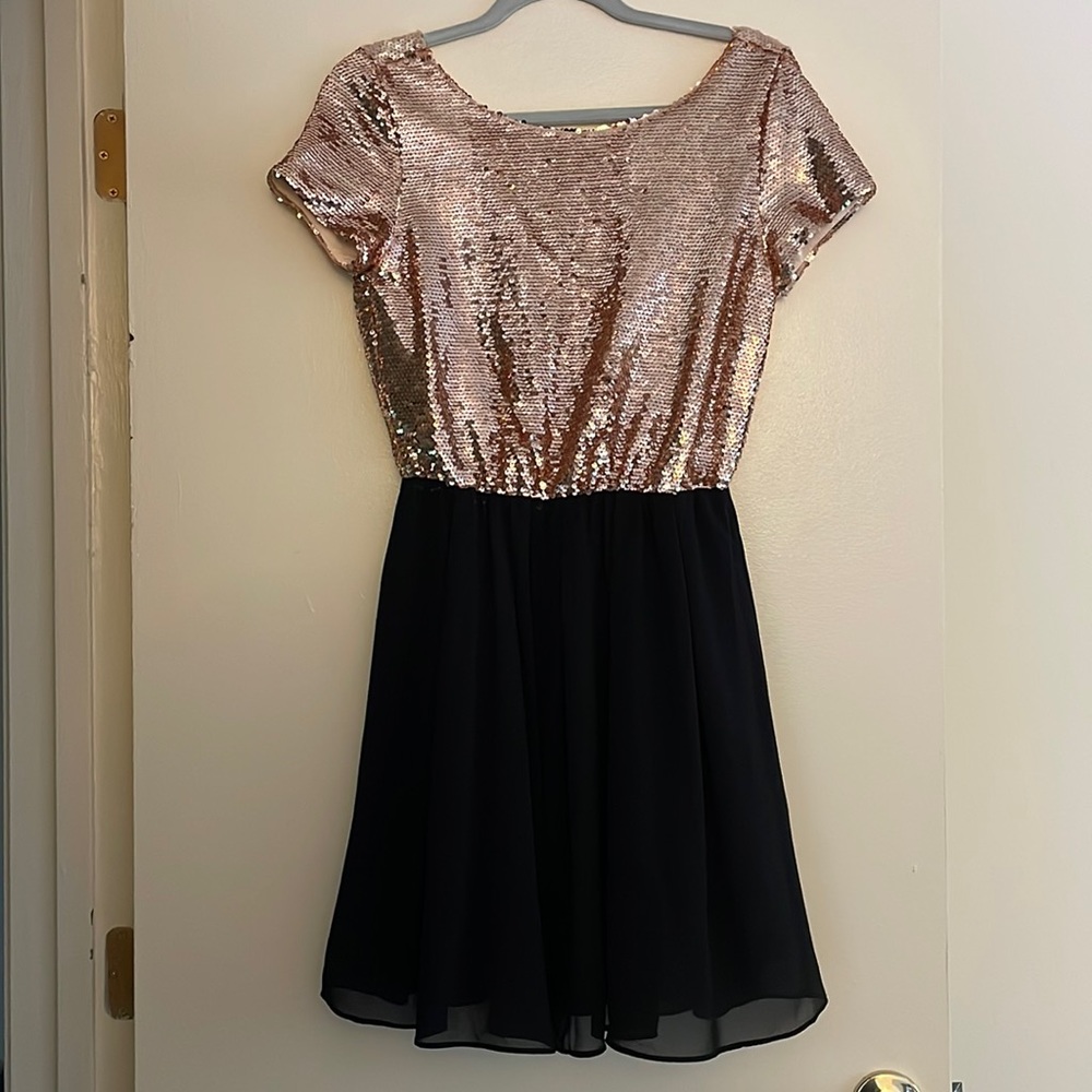 Size medium Midi dress with a gold-sequined top.